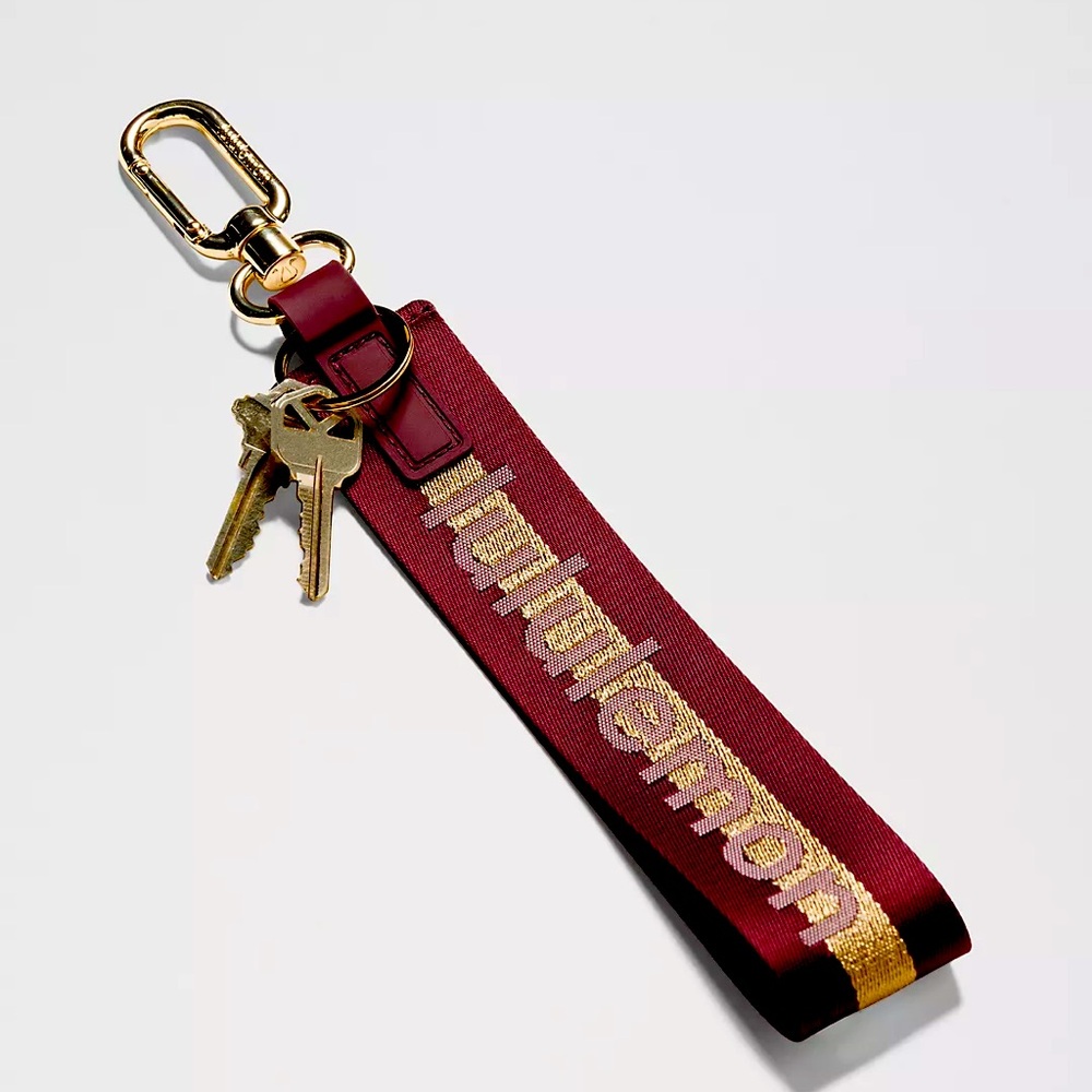 NWT Lululemon Never Lost Keychain In Gold And‎ Burgundy